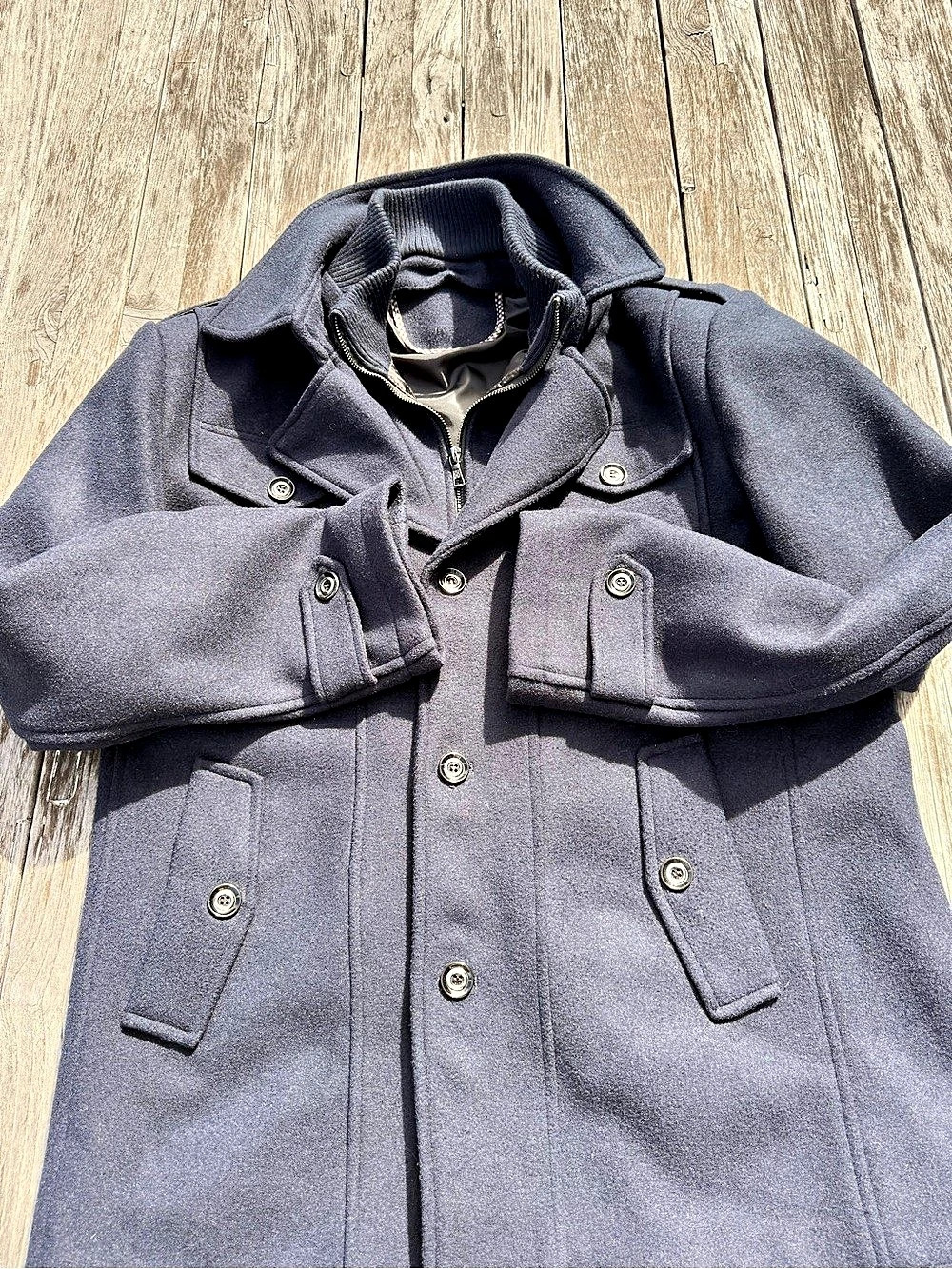 Classic men’s dark navy wool-blend coat with a rugged military/utility-inspired